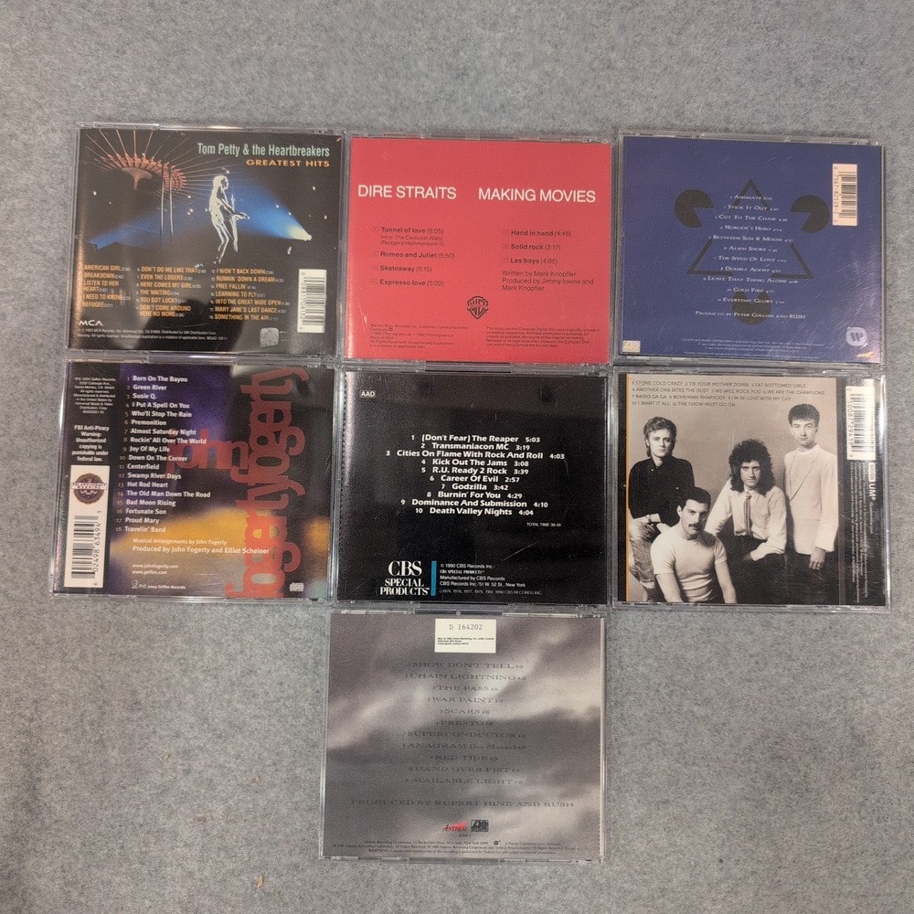 Classic Rock CD Lot 7 Tom Petty Rush Queen Dire Straits Blue Oyster Cult Fogerty - Picture 2 of 2